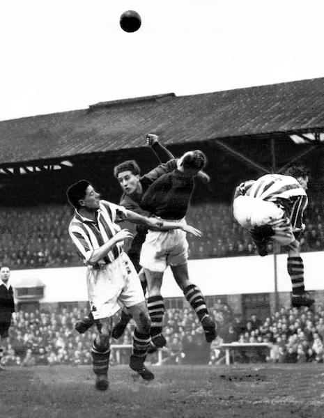 06-1950-02.12-Wolves-Heath punches clear